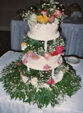 Tiered wedding cake with piped detail