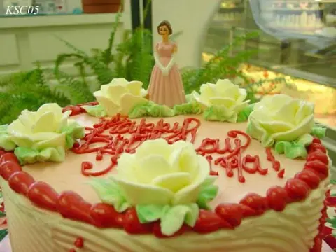 Baby shower cake with pastel icing